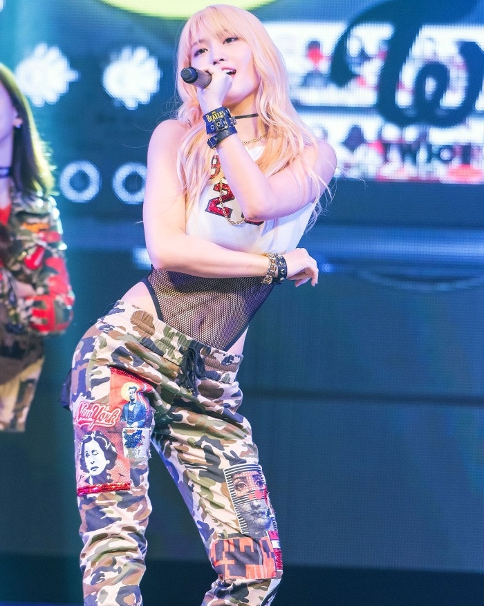 TWICE performing with charisma in sleek, glamorous costumes during their 2025 world tour.